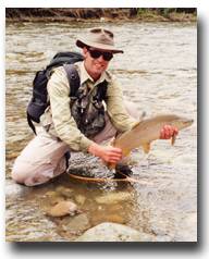 Motueka River Lodge's guide, David Pike, catch and release...